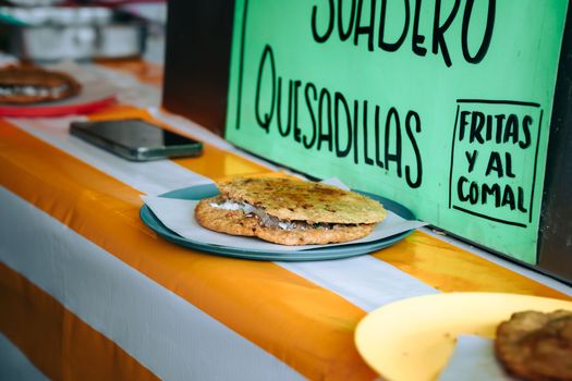Venezuelan Corn Cachapas Stuffed with Cheese and Onion