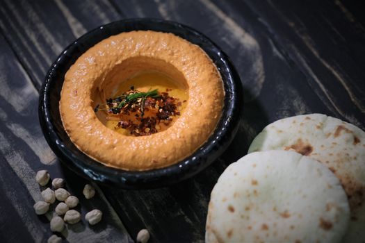 Smoky Paprika Peppers with Charcoal Chickpea Hummus